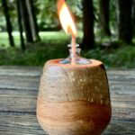 lit tea light, wooden tea light